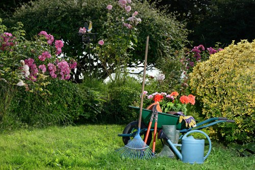 Gardener demonstrating planting technique to a customer